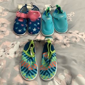 Kids NWT SPEEDO SPLASH AND SUN BOOTIE. Size L (9-10)